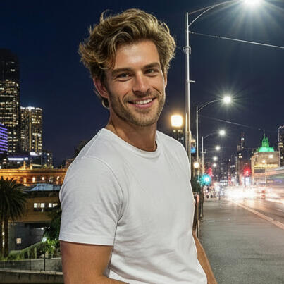 Image of Veyron Jaxx standing on a bridge overlooking the river in the city of Melbourne, Australia